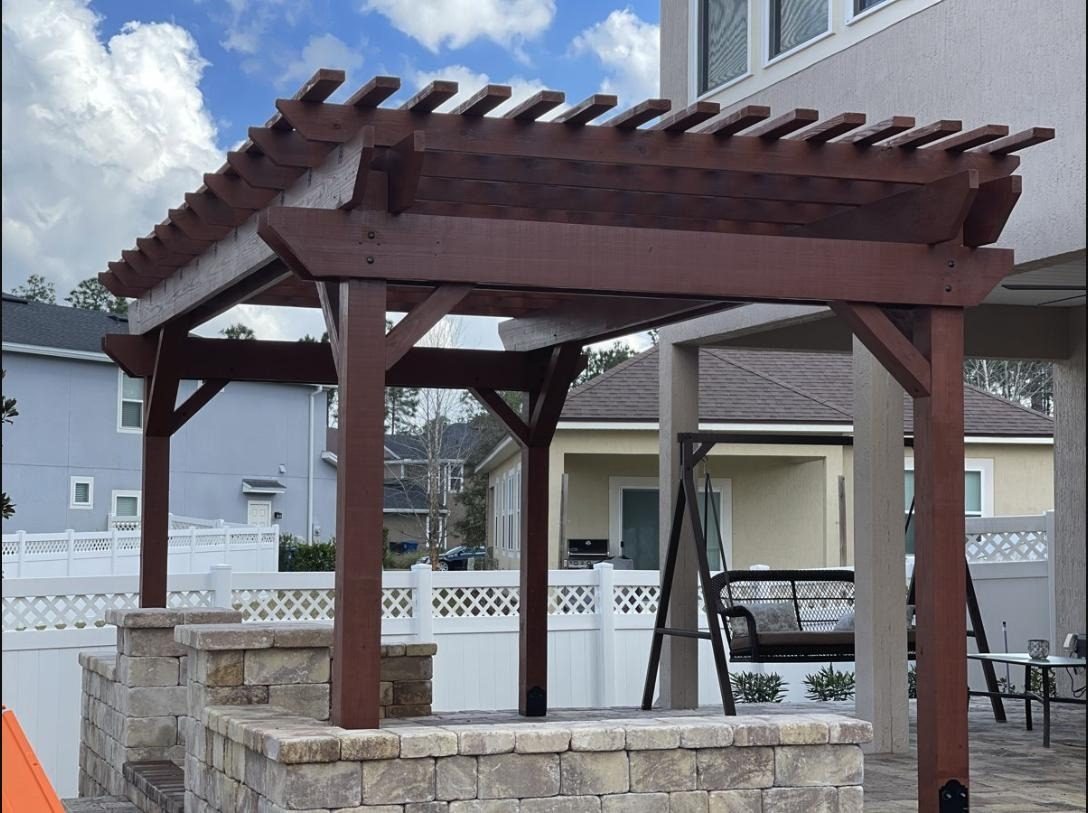 Cedar pergola with stone bases