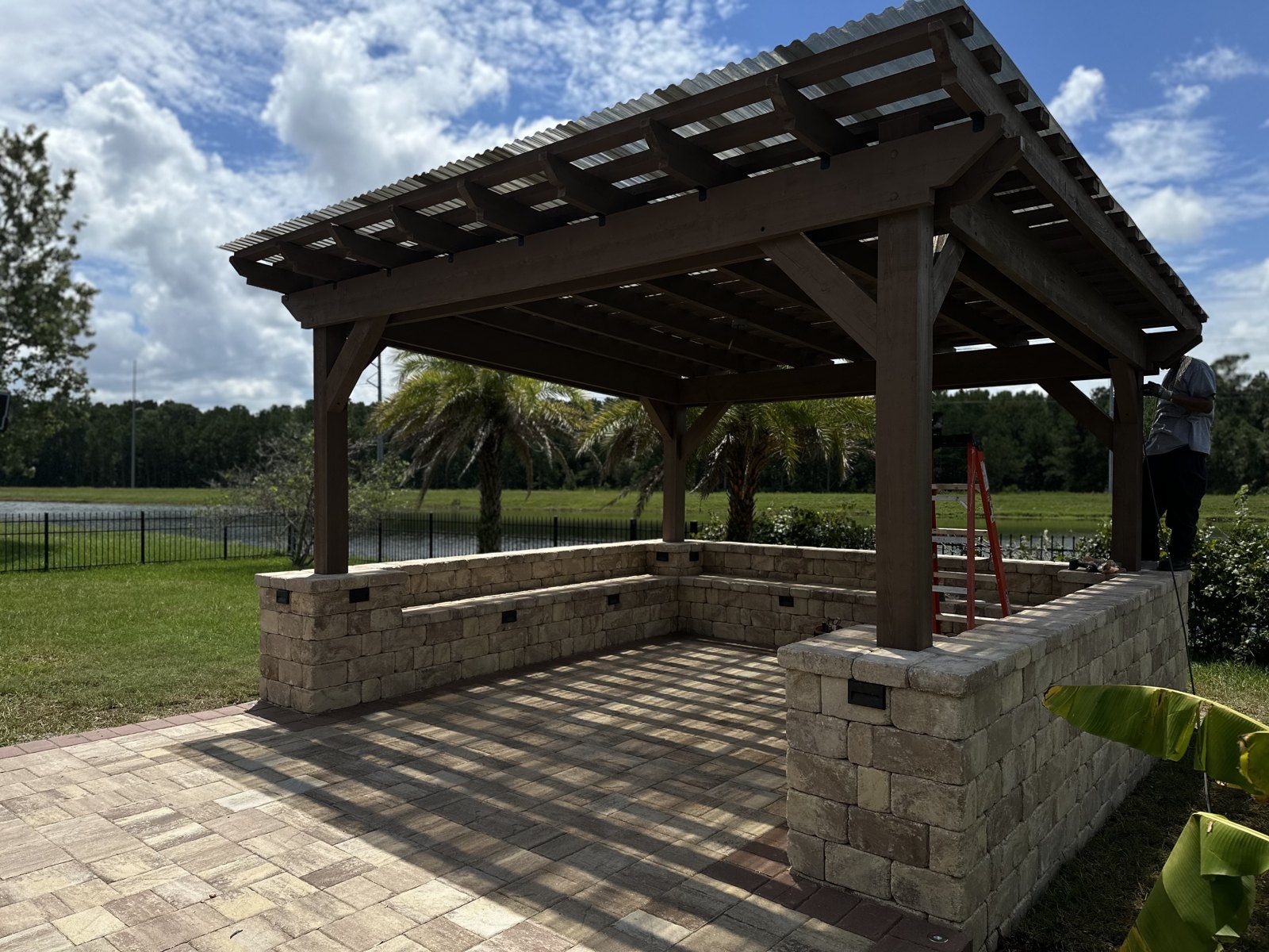 Pergola · Stone Seating Wall & Pool View
